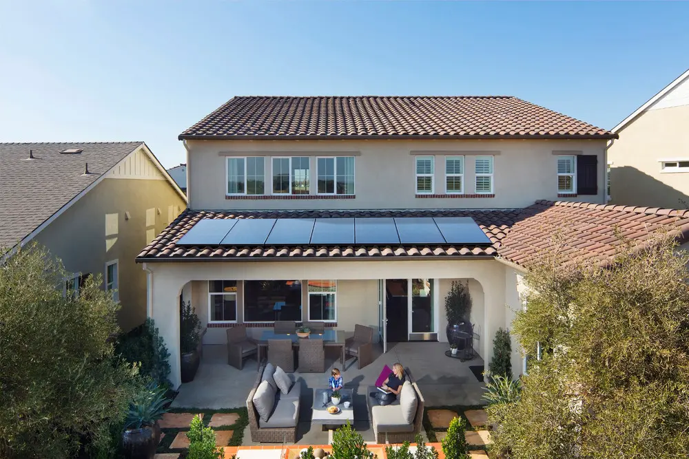 Residential solar installation with tile roof integration